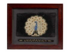 AN EMBROIDERED PANEL DEPICTING A PEACOCK, NORTHERN INDIA, CIRCA 1900
