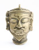 A SMALL BRASS MASK OF SIVA, MAHARASHTRA, CIRCA 18TH CENTURY