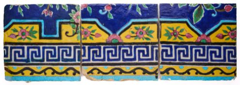 THREE QAJAR CUERDA SECA BORDER TILES, PERSIA, 19TH CENTURY
