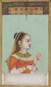 A LADY IN EUROPEAN DRESS HOLDING AN FRUIT, MUGHAL, PROBABLY LUCKNOW, 18TH CENTURY
