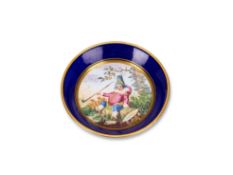 A SEVRES PORCELAIN BLEU NOUVEAU-GROUND MINIATURE SAUCER, CIRCA 1770