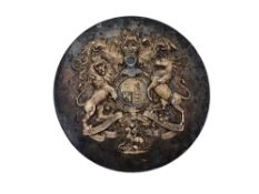 A CIRCULAR PARCEL-GILT PLAQUE, MID-19TH CENTURY OR LATER