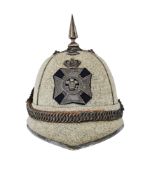 A VICTORIAN OFFICER'S HELMET OF THE CIVIL SERVICE RIFLE VOLUNTEER CORPS