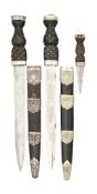 TWO SCOTTISH REGIMENTAL DIRKS, AND A SCOTTISH DRESS SGIAN DHU, 20TH CENTURY