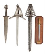 THREE LEFT-HAND DAGGERS, 19TH CENTURY