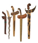 TEN BALINESE OR SUMATRAN KRIS, AND TWO SUMATRAN BADIKS, 19TH CENTURY AND LATER
