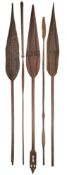 SIX AFRICAN AND OCEANIC PADDLE SPEARS, AND TEN VARIOUS AFRICAN SPEARS, MOSTLY 20TH CENTURY