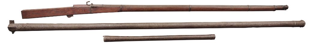 A LARGE INDIAN MATCH-LOCK WALL-PIECE, AN INDIAN WALL-PIECE BARREL OF LARGE BORE AND