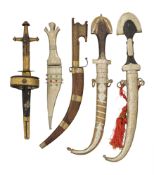 THIRTY-THREE VARIOUS EASTERN DAGGERS, MOSTLY 20TH CENTURY