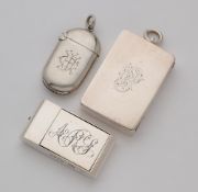 THREE VICTORIAN SILVER VESTA CASES, 1884/85