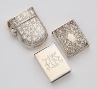 THREE VICTORIAN SILVER VESTA CASES, 1884-86