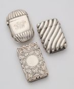 THREE VICTORIAN SILVER VESTA CASES, 1884-86