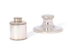 AN EDWARDIAN SILVER INKWELL AND A GEORGE V SILVER TEA CADDY