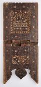 A CARVED WOOD FOLDING QUR'AN STAND, PROBABLY ZANZIBAR, LATE 19TH/EARLY 20TH CENTURY