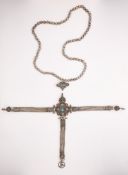 AN INLAID SILVER WOMAN'S BELT ORNAMENT WITH MATCHING CHAIN, TIBET, EARLY 20TH CENTURY