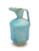 A KASHAN TURQUOISE GLAZED EWER, PERSIA, 12TH/13TH CENTURY
