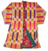 A CHILD'S IKAT CHAPAN, UZBEKISTAN, EARLY 20TH CENTURY