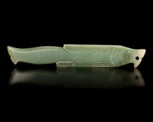 A GREEN JADE FISH PENDANT, SHANG DYNASTY, (c. 1600–1046 BC).