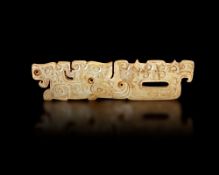 A JADE PENDANT, CHINA, ZHOU DYNASTY, (c. 1046–256 BC).