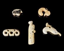A NEOLITHIC HORN PENDANT WITH FIVE OBJECTS, CHINA