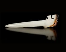 A WHITE JADE HAIRPIN, CHINA, SHANG DYNASTY. (c. 1600–1046 BC).