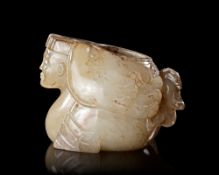 A CHINESE JADE JAR OF A WINGED MAN, WESTERN HAN DYNASTY (206 BC–9 AD)