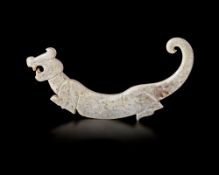 A CHINESE TIGER-SHAPED JADE PLAQUE, POST–SHIJIAHE CULTURE (c.2000 BC-1800 BC)