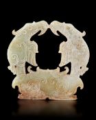 A CHINESE GREEN JADE TWIN-EAGLE PLAQUE, POST-SHIJIAHE CULTURE (CIRCA 2000–1800 BC)