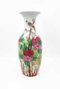 A Chinese Famille rose bird and peonies decorated porcelain vase