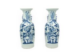 A pair of Chinese blue and white porcelain vases with phoenixes in nature
