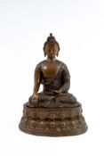 A large and Tibetan decorated and patinated bronze Buddha figure of Shakyamuni