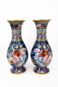 A pair of large and Chinese finely floral decorated cloisonne vases