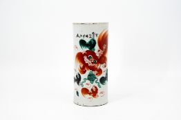 A Chinese cylinder shaped Qianjiang cai with Buddhist-lion decorated porcelain hat vase