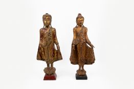 A composed lot of two Thai polychrome carved wood sculptures of standing Buddha's