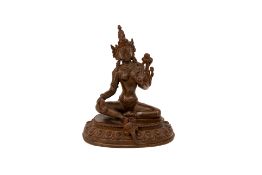 A Tibetan patinated bronze seated Buddha figure of Tara