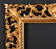 19th Century Italian School. A Carved Giltwood Florentine Frame, rebate 12