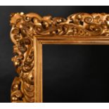 19th Century Italian School. A Carved Giltwood Florentine Frame, rebate 29" x 23.25" (73.7 x 59.