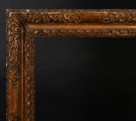 19th Century English School. A Painted Carved Wood Frame with Lely panels, rebate 30