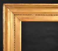 19th Century English School. A Gilt Composition Frame (a horizontal frame with central motif),