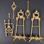 20th Century English School. A Pair of Brass Picture Stands, height 9.75