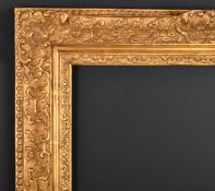 20th Century English School. A Carved Giltwood Frame, with swept centres and corners, rebate 22