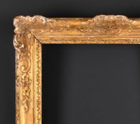 19th Century English School. A Carved Giltwood Frame, with swept centres and corners, rebate 26.