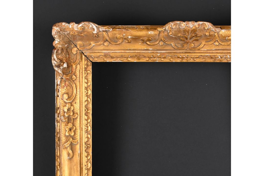 19th Century English School. A Carved Giltwood Frame, with swept centres and corners, rebate 26. - Image 1 of 3