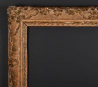 20th Century French School. A Painted Carved Wood Frame, with swept centres and corners, rebate