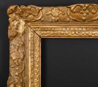 Late18th Century French School. A Gilt and Painted Carved Frame with swept centres and corners,