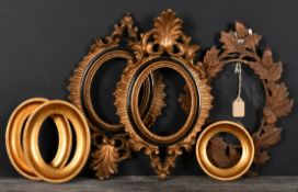 20th Century English School. A Carved Wood Oval Frame, with inset glass, rebate 4.6