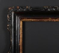 19th Century Chinese School. A Black Painted Carved Wood Frame with a gilt inner edge, rebate 14.