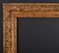 17th Century French School. A Louis XIII Carved Giltwood Frame, rebate 18.5