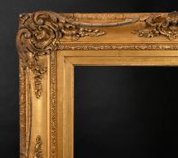 19th Century English School. A Gilt Composition Frame, with swept and pierced centres and corners,