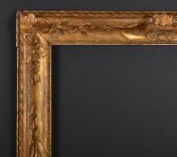 19th Century English School. A Painted Carved Wood Frame, with swept centres and corners, rebate